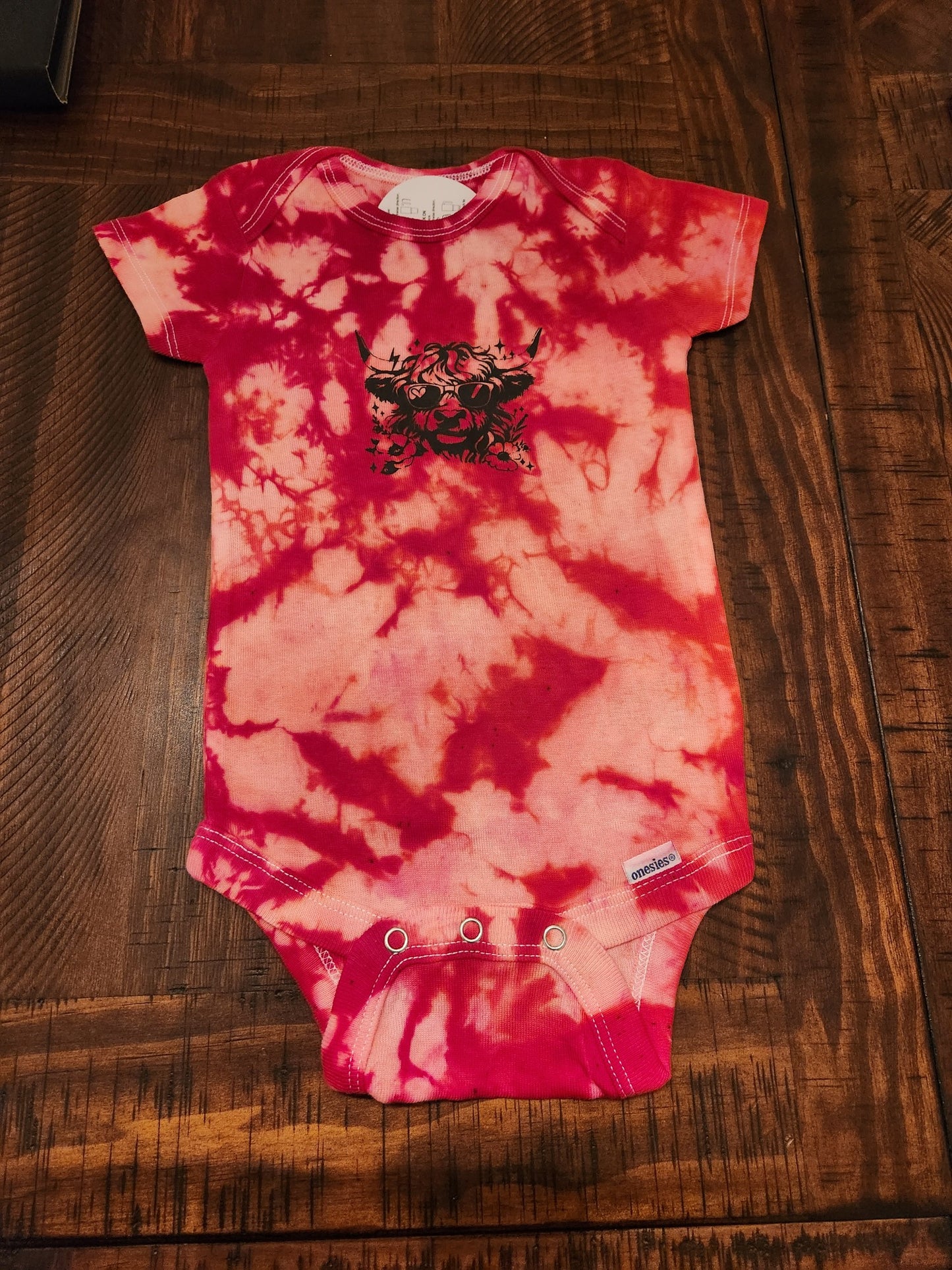 “Red Burst - Shaggy Cow” Ice Dye Short Sleeve Onesie