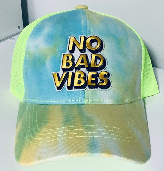 TD-1: Tie Dye Light Green PonyTail Hat with “No Bad Vibes” Yellow Patch